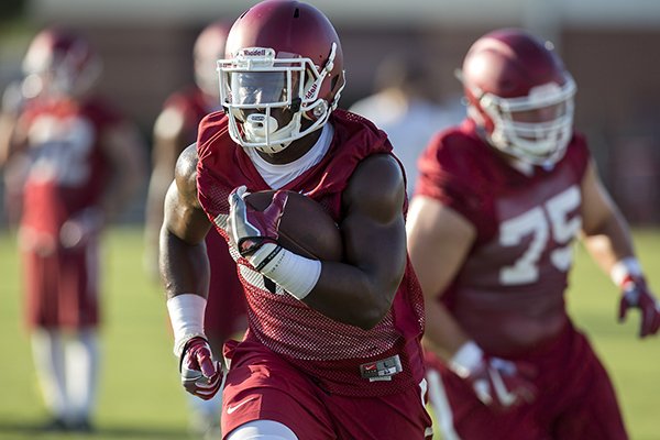 Arkansas running back Rawleigh Williams goes through practice Thursday, Aug. 4, 2016, in Fayetteville. 