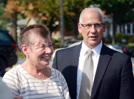 In this Sept. 3, 2015 file photo, Sharon and Randy Budd talk with friends and relatives outside the Union County Court House in Lewisburg, Pa., after three young men were sentenced to time behind bars for throwing a rock off a highway overpass in central Pennsylvania, causing severe brain trauma to Sharon, an Ohio teacher. 
