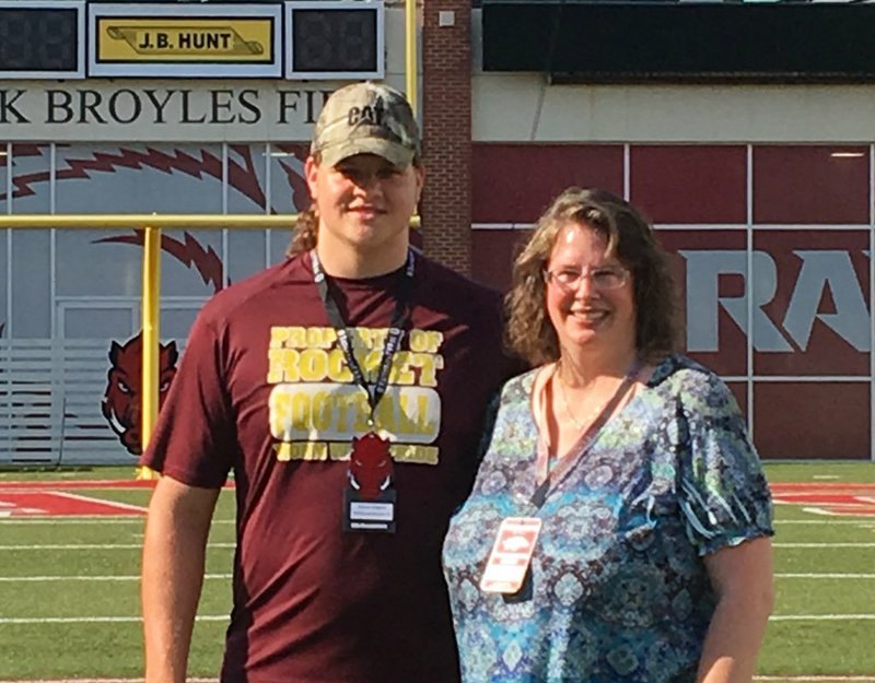 Arkansas offensive tackle Dalton Wagner and his mother, Nancy pose during a recruiting visit to Fayetteville. 
Photo courtesy of Nancy Wagner. 