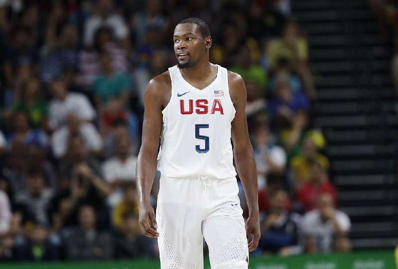 United States' Kevin Durant (5) walks up court during a men's basketball game against Venezuela at the 2016 Summer Olympics in Rio de Janeiro, Brazil, Monday, Aug. 8, 2016. 