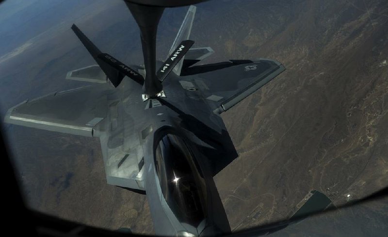 An F-22A Raptor assigned to the 27th Fighter Squadron of Joint Base Langley-Eustis, Va., is refueled in-air by a KC-135 Stratotanker during the Red Flag exercise over the Nevada Test and Training Range on July 27. 