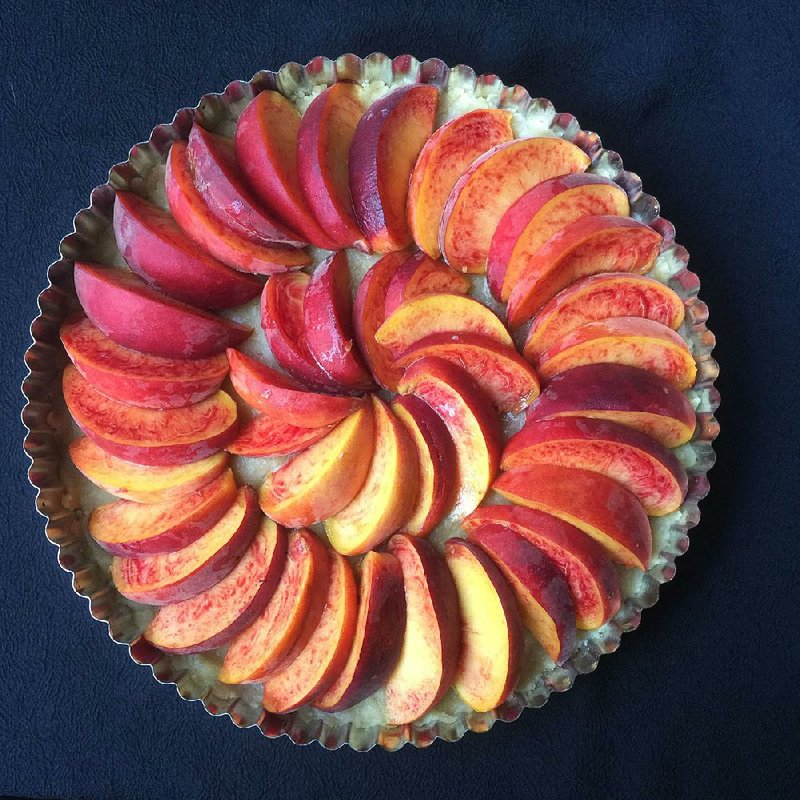 Julyprince peaches give this Peach Tart (pictured before baking) a vibrant red hue. 