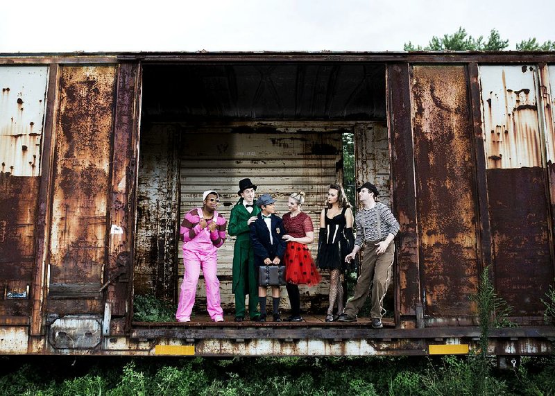 Braxton O. Johnson (from left), Daniel Collier, John Michael Murphy, Marcia Brown, Avery Bruce and Ryan Whitfield star in James and the Giant Peach. 
