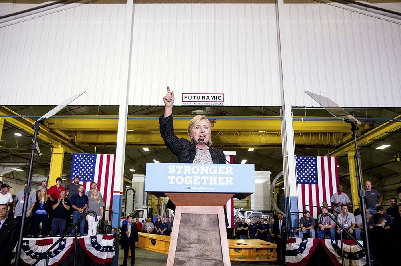 Hillary Clinton said Thursday in Warren, Mich., that she offers steady leadership to guide the economy, adding that “insults and bullying” were not the way to get things done. 