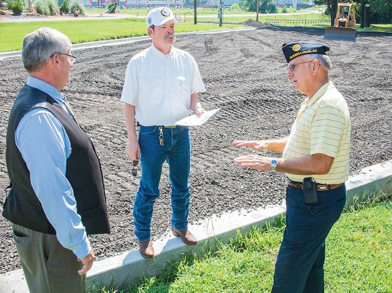 Russellville Mayor Randy Horton, from left, talks with Pope County Veterans Service Officer Ken Harper and River Valley Veterans Coalition member Bill Eaton on the first-phase progress of Veterans Memorial Park at the Bona Dea Trails and Sanctuary. Eaton said asphalt should be poured this week on the parking lot. A Walk of Honor will be built next, and tiles for the walk can be ordered by calling Harper at (479) 968-6049.