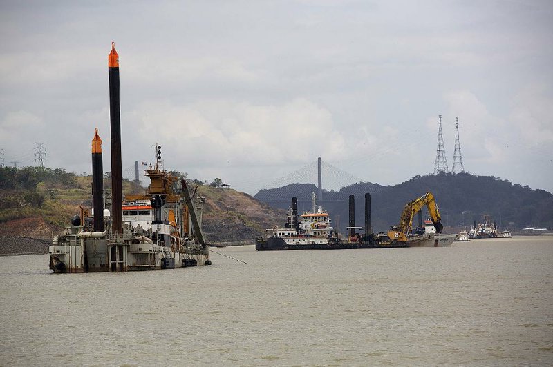 Dredging boats work in the new, expanded section of the Panama Canal in Cocoli, Panama, in April. 