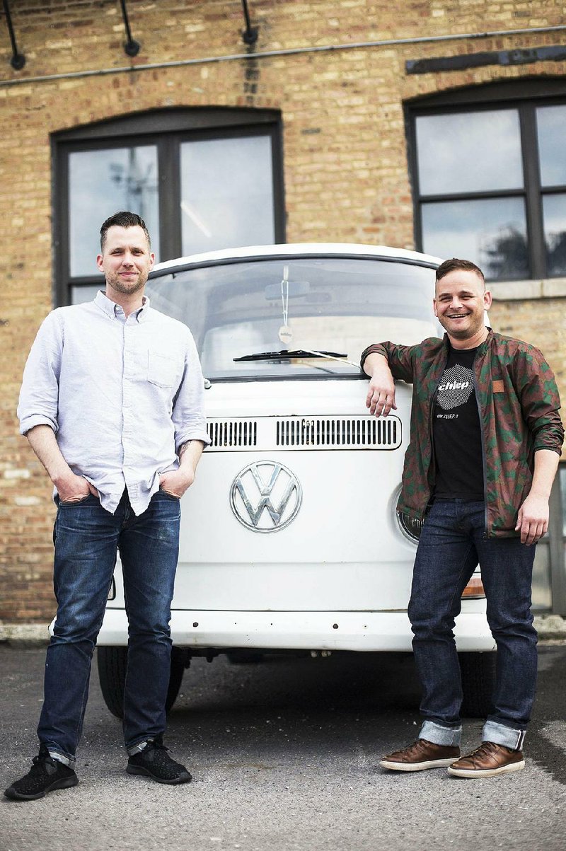 John Godwin (left) and Hunter Riley, childhood friends from North Little Rock, have started a company in Chicago that pairs people with pickups and other large vehicles with customers needing items moved. 