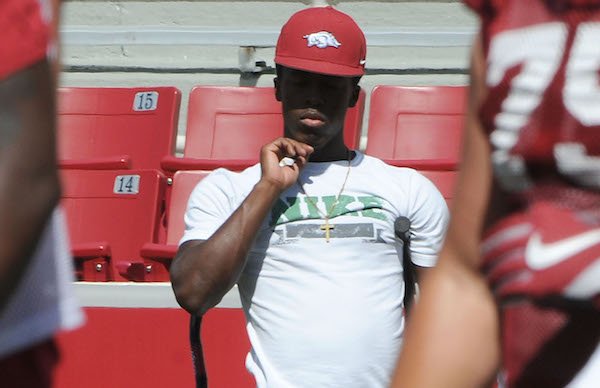 Kofi Boateng, University of Arkansas receiver, watches the Razorbacks practice Saturday, August 13, 2016 at Razorback Stadium in Fayetteville.