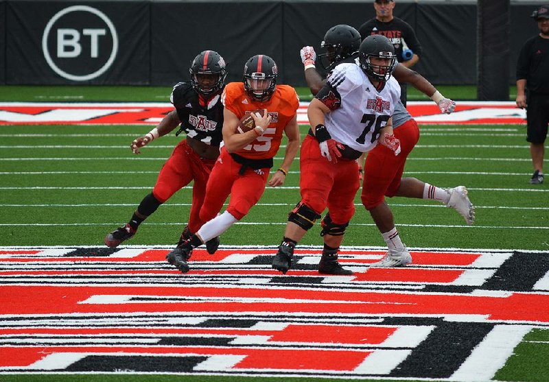 Arkansas State quarterback Justice Hansen completed 13 of 18 passes for 164 yards and 1 touchdown Saturday during the Red Wolves’ first full scrimmage of fall workouts. 
