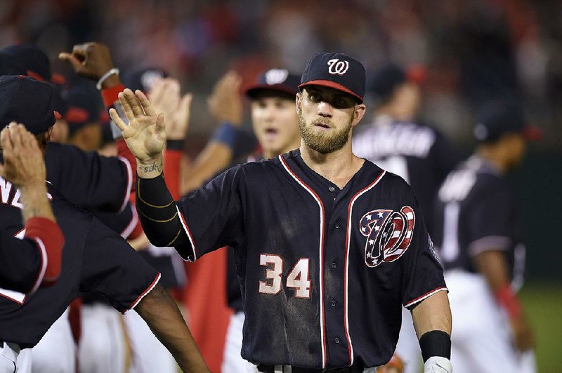 Washington Nationals right fielder Bryce Harper (34) was not in the lineup for Saturday’s game against the Atlanta Braves after undergoing an MRI for a neck injury. Nationals General Manager Mike Rizzo said the result “was clean” and described Harper’s injury as “a stiff neck that’s lingered on for five or six days.” 