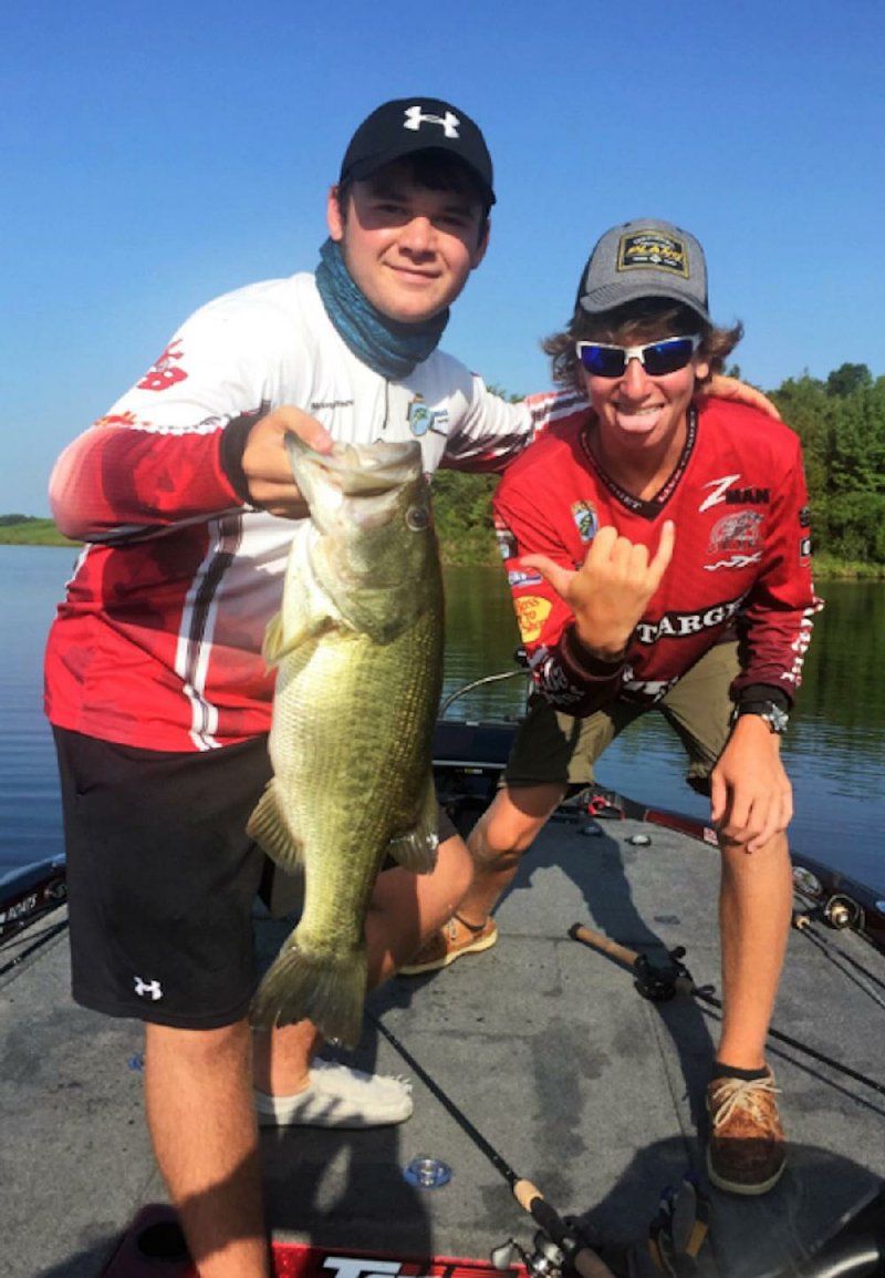 McCoy Vereen (left) caught this 5-pound, 6-ounce largemouth bass Aug. 3 while fishing with his partner, Beau Browning, to clinch the Bassmaster Junior National Championship on Thousand Acre Recreational Lake at Huntingdon, Tenn. 