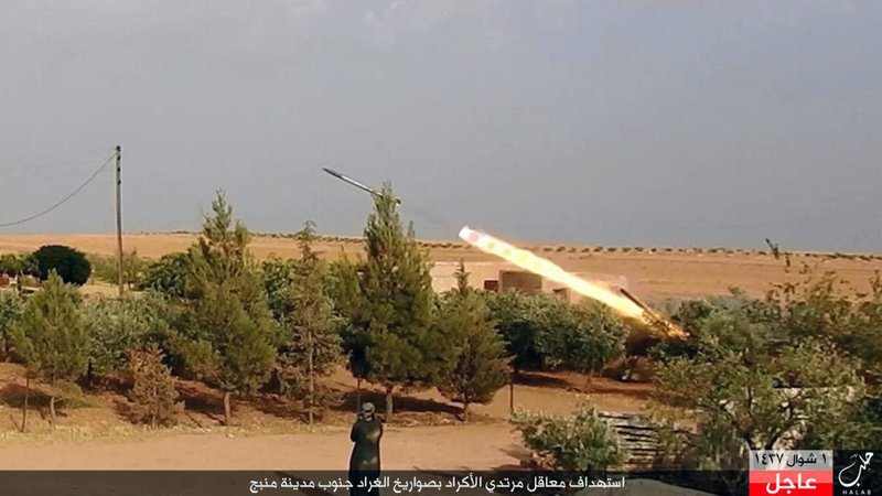 This image posted online on Wednesday, July. 6, 2016, by supporters of the Islamic State militant group on an anonymous photo sharing website, shows a member of Islamic State militants fires a Grad missile to shell towards Kurdish-led forces in Manbij, in Aleppo province, Syria. 