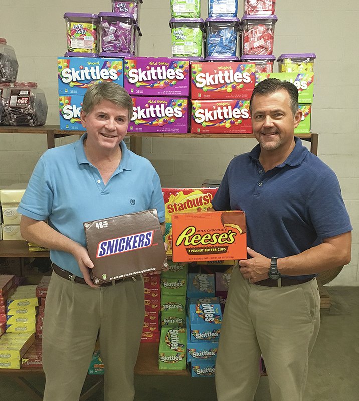 Submitted photo The new school year is approaching and Merritt Wholesale, 626 Ouachita Ave., is the one-stop shop for concession products for all events. According to Mike Dugan, left, general manager, and David Paul, sales manager, they carry a full line of candy, snack food, paper and janitorial products. Delivery is available. To place an order, call 623-6633.