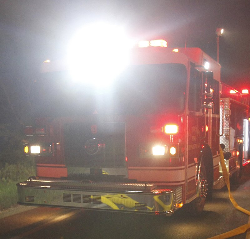 An El Dorado woman died in a house fire in the 11th block of Glenwood Drive early Saturday morning between 3:30 and 3:45 a.m.