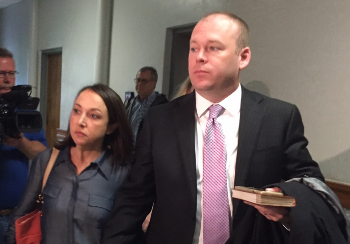 Garland County Circuit Judge Wade Naramore enters the courtroom with his wife, Ashley, before his trial begins Monday, Aug. 15, 2016.