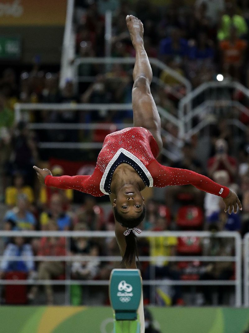 American gymnast Simone Biles turned a couple of slips into a bronze medal Monday in the balance beam final in Rio de Janeiro. Biles has earned four medals at the Olympics, three of them gold. She’s not done yet.