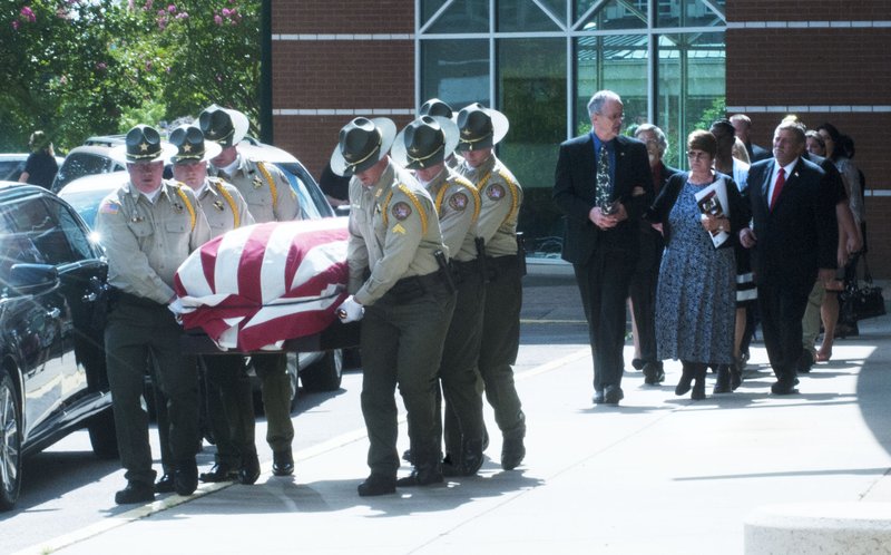 NWA Democrat-Gazette/MICHAEL WOODS &#8226; @NWAMICHAELW Pallbearers from the Sebastian County Sheriff&#8217;s Office Honor Guard carry Cpl. Bill Cooper&#8217;s casket Tuesday. The Sebastian County Sheriff&#8217;s Office deputy was killed in the line of duty while responding to a call last week.