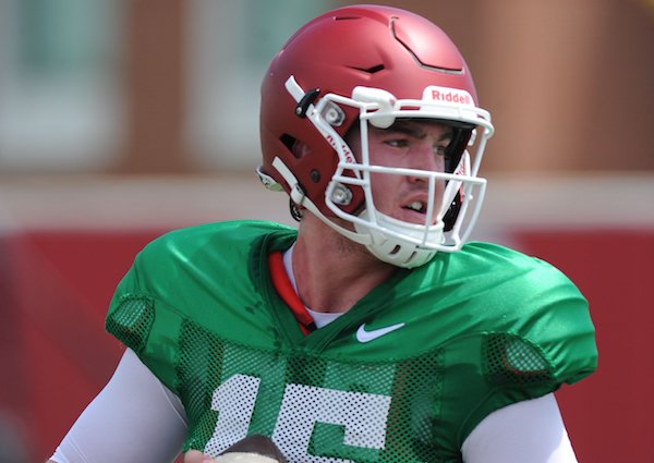 Arkansas quarterback Cole Kelley participates in a drill during practice Saturday, Aug. 6, 2016, at the football practice field on the university campus in Fayetteville. Visit nwadg.com/photos to see more photographs from the day's practice.