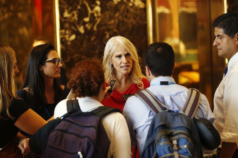 Kellyanne Conway, a Republican strategist and pollster, talks with reporters Wednesday at Trump Tower in New York. Conway, a senior adviser to Donald Trump, has been promoted to campaign manager. 