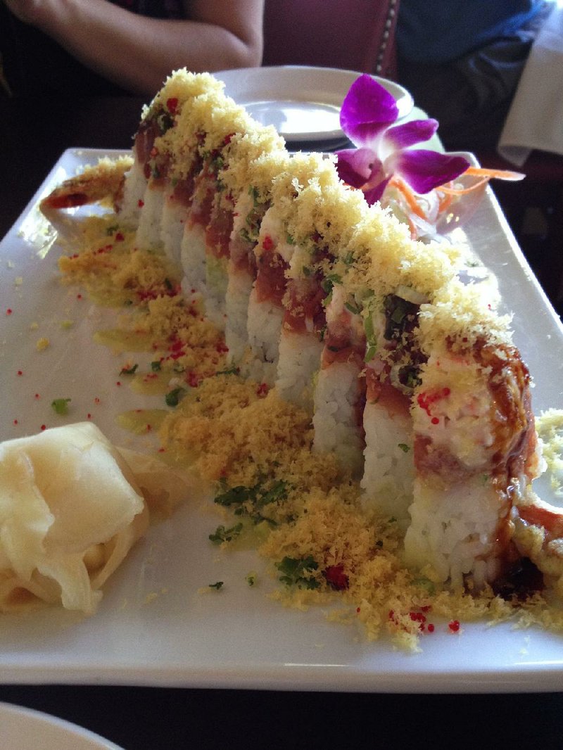 The Crazy Lover Roll (tempura shrimp, crab stick, avocado, salmon) is one of the specialty rolls at Kemuri, which MSN has picked as the best sushi restaurant in Arkansas. 