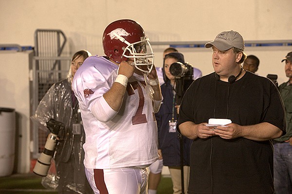 Actor Chris Severio, left, speaks with David Hunt, director of the film "Greater" during a May 2013 shoot at War Memorial Stadium in Little Rock. 