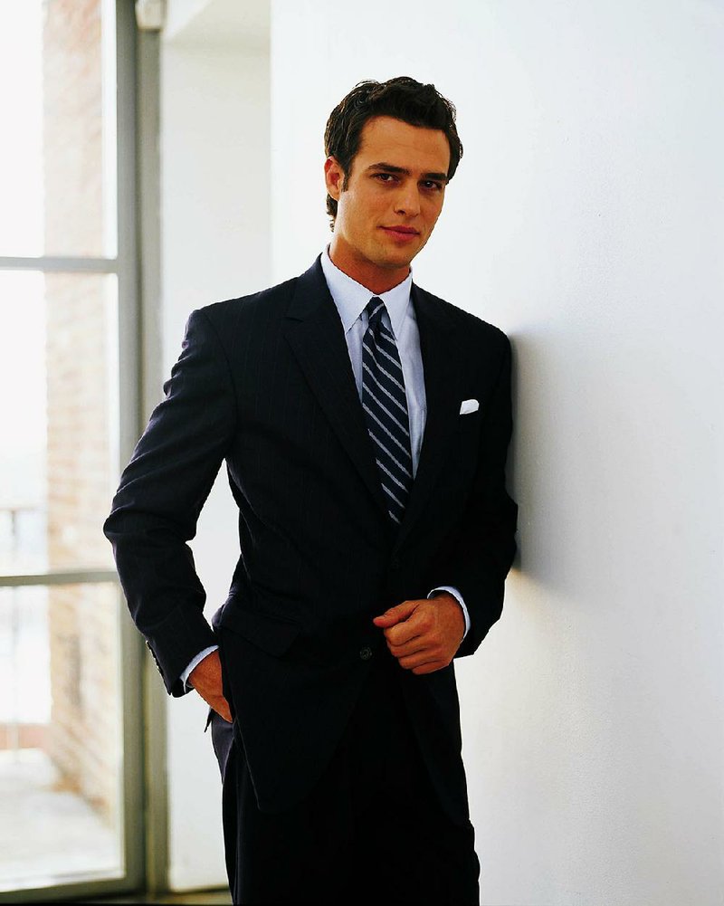 The suits in a man’s closet should be bought in a manner of priority, beginning with a single-breasted solid dark blue suit. 