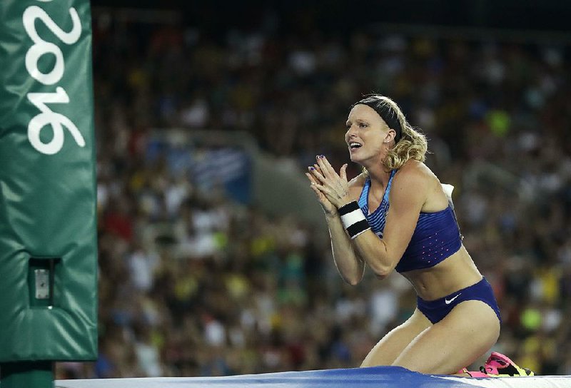 Former Arkansas Razorbacks pole vaulter Sandi Morris reacts after grazing the bar on her fi nal attempt at 16-03/4 during Friday’s competition at the Rio Games. The miss cost Morris a gold medal in her fi rst Olympics, but she still walked away with the silver. Greece’s Ekaterini Stefanidi cleared 15-10¾, the same height that Morris
cleared but had one fewer miss, which allowed her to grab top honors. New Zealand’s Eliza McCartney finished with the bronze