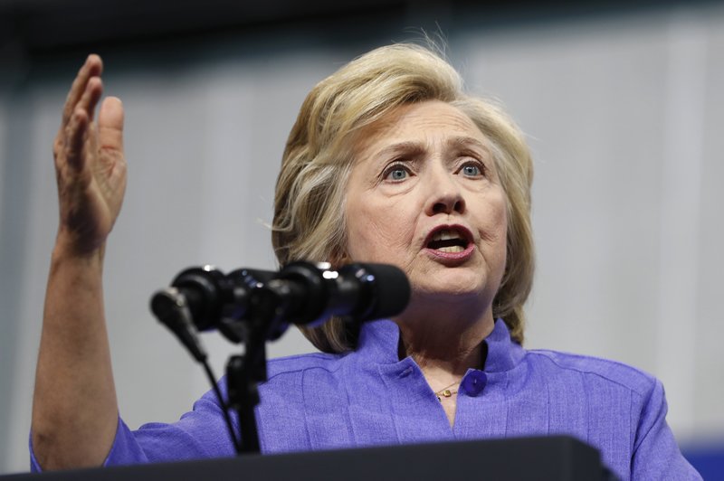 In this Aug. 15, 2016, photo, Democratic presidential candidate Hillary Clinton speaks at a campaign event at Riverfront Sports in Scranton, Pa. A federal judge has ordered Clinton to answer questions in writing from a conservative legal advocacy group about her use of a private email server during her tenure as secretary of state. U.S. District Court Judge Emmet G. Sullivan issued the order Aug. 19, as part of a long-running public records lawsuit filed by Judicial Watch. (AP Photo/Carolyn Kaster)