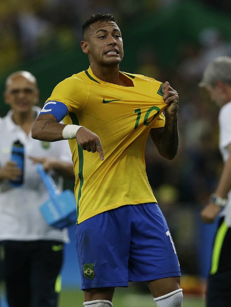 Brazil's Neymar celebrates scoring his side's first goal during the final match of the men's Olympic football tournament between Brazil and Germany at Maracana stadium in Rio de Janeiro, Brazil, Saturday, Aug. 20, 2016. 