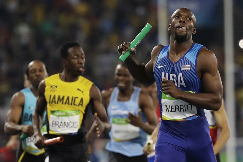 American sprinter LaShawn Merritt crosses the fi nish line to win the men’s 1,600-meter relay Saturday at Olympic Stadium in Rio de Janeiro. The Americans fi nished in 2 minutes, 57.30 seconds, 0.86 seconds ahead of Jamaica.