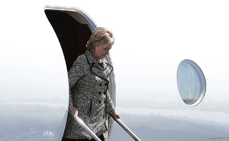 Hillary Clinton arrives Saturday for a campaign rally at Nantucket, Mass. As she seeks the presidency, the Clinton Family Foundation continues to donate to a wide range of groups in Arkansas, many with long ties to the Clintons. 