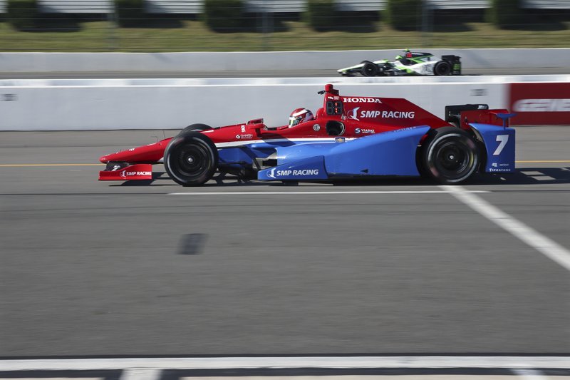 Mikhall Aleshin, of Russia, (7) drives from a pit stop during practice for Sunday's Pocono IndyCar 500 auto race Saturday, Aug. 20, 2016 in Long Pond, Pa. 