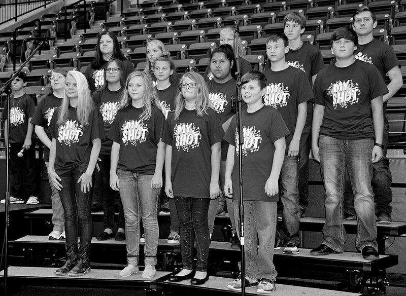 Submitted photo Lake Hamilton choir students recently performed "One Shot" during professional development for faculty and staff at Lake Hamilton Wolf Arena. Students were directed by Paul Graves, Beth Parks and Jacob Richardson.