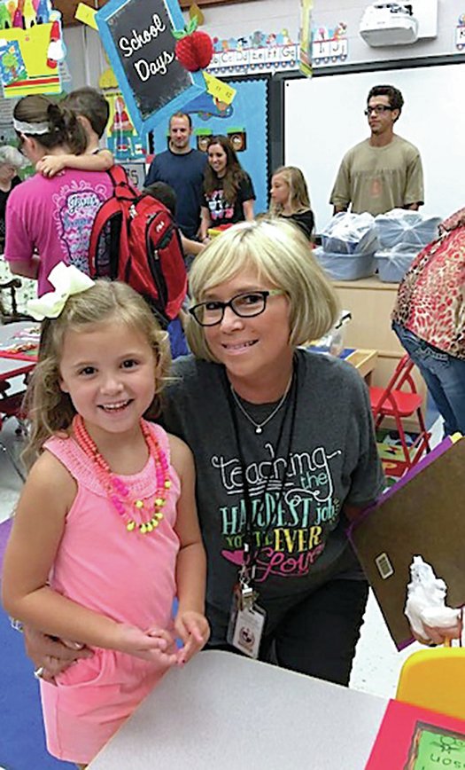 Submitted photo Preschool teacher Leeann Stroud, right, welcomed Kinsley Robertson to her first day of class at Fountain Lake Elementary School Monday.