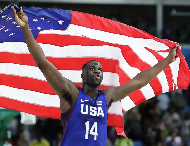 United States forward Draymond Green celebrates after helping the Americans win their 25th consecutive game at the Olympics and their third consecutive gold medal by knocking off Serbia 96-66 on Sunday at Carioca Arena in Rio de Janeiro.