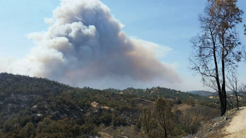 Smoke billows from a wildfi re in San Luis Obispo County, Calif., on Saturday.