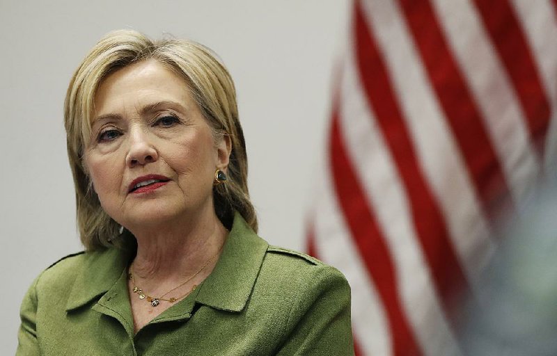 In this photo taken Aug. 18, 2016, Democratic presidential candidate Hillary Clinton speaks to media as she meets with law enforcement leaders at John Jay College of Criminal Justice in New York. 