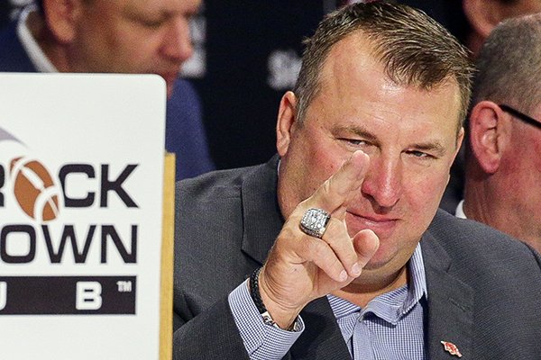 Arkansas coach Bret Bielema motions to the crowd before speaking at the Little Rock Touchdown Club on Monday, Aug. 22, 2016, at Embassy Suites in Little Rock. 