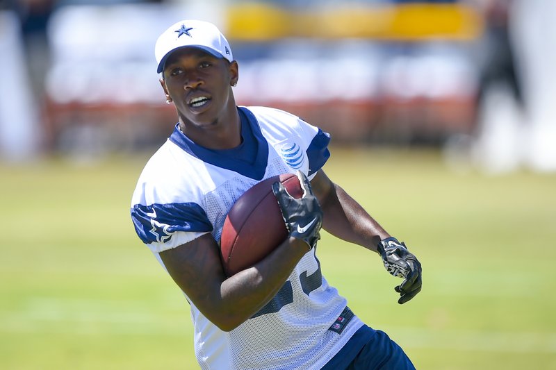 This Aug. 4, 2015 photo shows Dallas Cowboys running back Lance Dunbar making a reception during Dallas Cowboys' NFL football training camp in Oxnard, Calif. Dunbar was cleared medically this week following major knee surgery last year. 