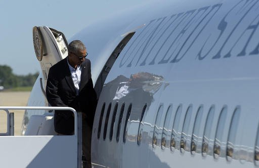 President Barack Obama walks boards Air Force One at Andrews Air Force Base, Md., on Tuesday, Aug. 23, 2016.