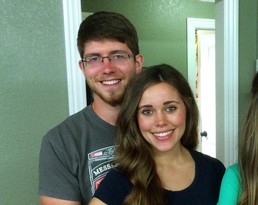 This image released by TLC shows, Ben Seewald, left, and Jessa Seewald, stars of the reality series, "Jill & Jessa Counting On." 