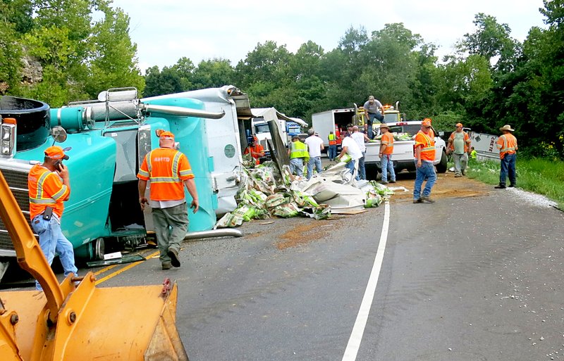 An accident involving two tractor-trailer rigs occurred just south of Gravette on Arkansas Highway 59 on Tuesday afternoon, Aug. 23, 2016. The accident caused a road closure while spilled dog food was cleaned up.
