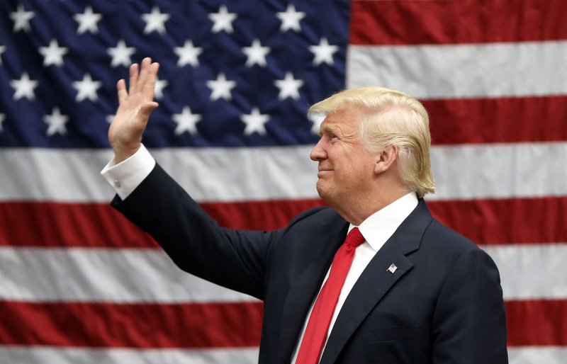 Republican presidential candidate Donald Trump arrives to speak at a campaign rally in Akron, Ohio, Monday, Aug. 22, 2016.