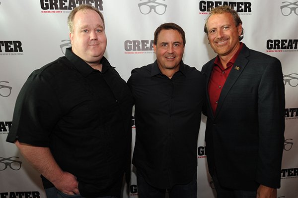 Director David Hunt (from left) poses Tuesday, Aug. 23, 2016, with producer Brian Reindl, and Marty Burlsworth, brother of Brandon Burlsworth, during a red carpet event ahead of the premiere of the movie "Greater" at the Malco Razorback Cinema 16 in Fayetteville.