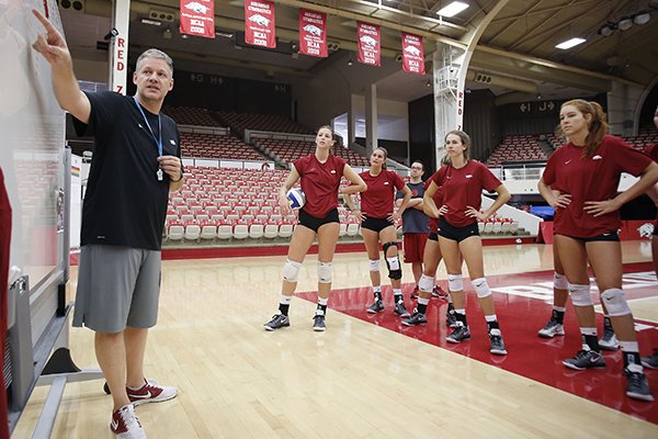 Arkansas volleyball coach Jason Watson talks to players during practice Friday, Aug. 19, 2016, at Barnhill Arena in Fayetteville. 