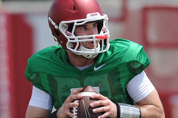 Arkansas quarterback Ty Storey participates in a drill during practice Saturday, Aug. 6, 2016, at the football practice field on the university campus in Fayetteville.