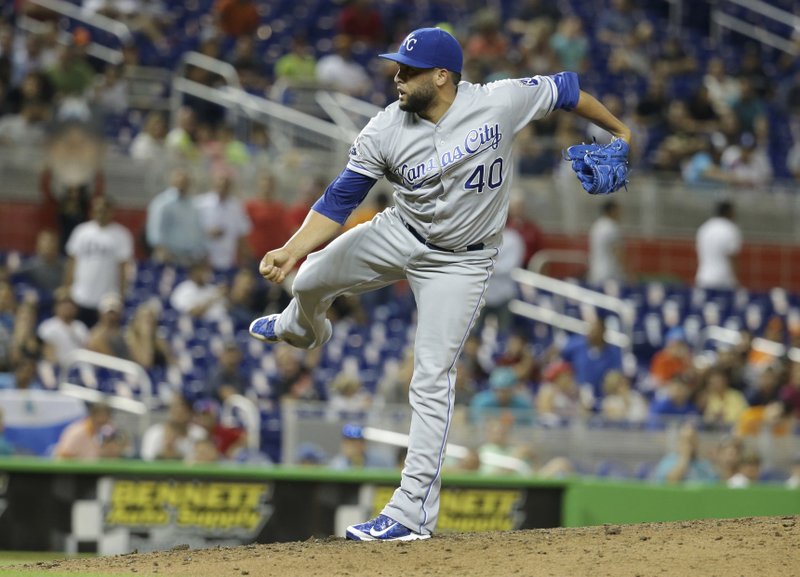 Kansas City Royals relief pitcher Kelvin Herrera (40) follows through on a pitch against the Miami Marlins on Tuesday in Miami.