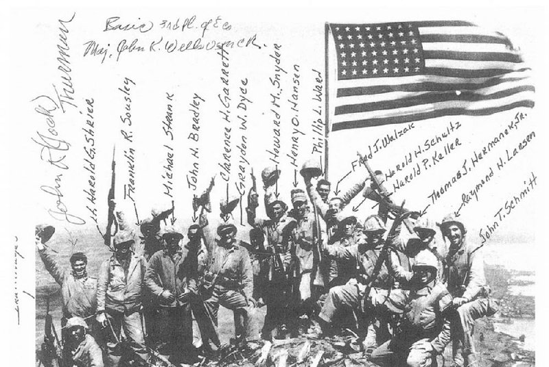 Marines celebrate during the second flag-raising on Iwo Jima on Feb. 23, 1945.