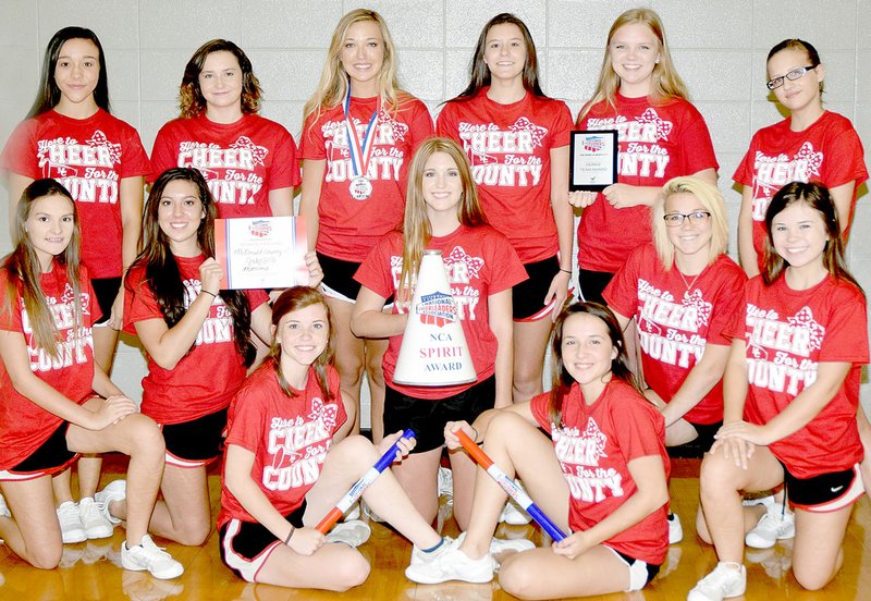 Photo by Rick Peck The McDonald County High School varsity cheerleaders received several awards at a camp held this summer at Springdale High School. Pictured, from left, are: Front row: Brookelynn Cooper, Madison Smith and Hannah Huber. Middle row: Caitlynn Stouder, Payton Walters, Hannah Leonard, Jessica Rose and Lilly Parnell. Back row: Allyson Dill, Joslyn Banta, Carlie Dill Bailey Barrett and Abby Bishop. Not present: Kitrell Hennighan.