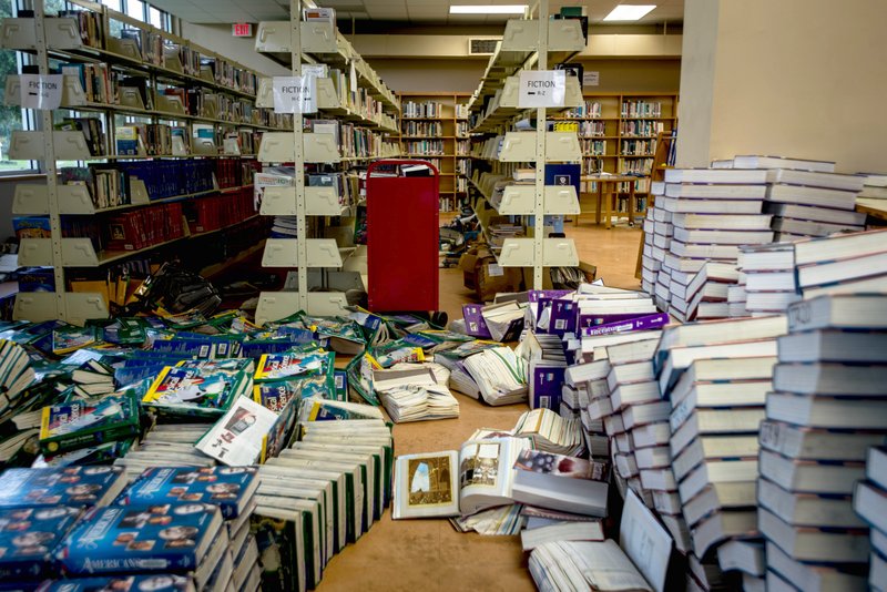 Textbooks dry in the library of Baker High School in Baker, Louisiana. Students had been back in class for only two days before the flooding. 